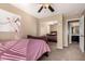 Light and airy bedroom with a full-size bed and mirrored closet at 472 W Dragon Tree Ave, Queen Creek, AZ 85140