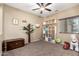 bedroom with toy storage and a ceiling fan at 472 W Dragon Tree Ave, Queen Creek, AZ 85140