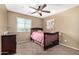 Charming bedroom with a crib and plenty of space at 472 W Dragon Tree Ave, Queen Creek, AZ 85140