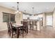 Modern kitchen with white cabinets and stainless appliances at 472 W Dragon Tree Ave, Queen Creek, AZ 85140