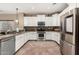 Modern kitchen with white cabinets and granite counters at 472 W Dragon Tree Ave, Queen Creek, AZ 85140