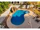 Inviting backyard pool with a waterslide feature at 472 W Dragon Tree Ave, Queen Creek, AZ 85140