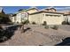 Cute one-story house with a two-car garage and desert landscaping at 4828 W Topeka Dr, Glendale, AZ 85308