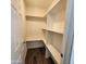 Well-lit pantry with ample shelving for storage at 5001 W Lamar Rd, Glendale, AZ 85301