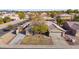 Aerial view of a single-story house with a landscaped yard and driveway at 5332 W Belmont Ave, Glendale, AZ 85301