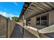 Covered patio with gravel flooring and a view of the backyard at 5748 N 67Th Dr, Glendale, AZ 85303