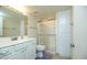 Bright bathroom with a shower, toilet, vanity, and linen cabinet at 7940 E Camelback Rd # 608, Scottsdale, AZ 85251