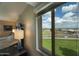 Bedroom with a view of a city landscape and golf course from the window at 7940 E Camelback Rd # 608, Scottsdale, AZ 85251