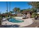 Resort-style pool with expansive patio, pergola, and lush landscaping at 8330 E Captain Dreyfus Ave, Scottsdale, AZ 85260