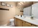 Clean bathroom with single sink vanity and shower/tub combo at 8717 W Wilshire Dr, Phoenix, AZ 85037