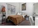 Cozy bedroom with a double bed and adjacent closet at 8717 W Wilshire Dr, Phoenix, AZ 85037