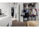 Small bedroom with closet and access to hallway at 8717 W Wilshire Dr, Phoenix, AZ 85037