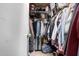 Well-lit walk-in closet with ample storage space at 8717 W Wilshire Dr, Phoenix, AZ 85037
