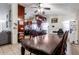 Kitchen with dark wood cabinets and stainless steel appliances at 8717 W Wilshire Dr, Phoenix, AZ 85037