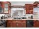 Inviting kitchen with ample counter space and storage at 8717 W Wilshire Dr, Phoenix, AZ 85037