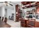 Spacious kitchen features an island and breakfast bar at 8717 W Wilshire Dr, Phoenix, AZ 85037