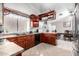 Well-equipped kitchen boasts ample cabinetry and counter space at 8717 W Wilshire Dr, Phoenix, AZ 85037