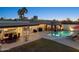 Aerial view showcasing a spacious backyard with a sparkling pool and patio area at 8856 E Altadena Ave, Scottsdale, AZ 85260