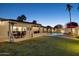 Expansive backyard with pool, patio, and artificial turf at 8856 E Altadena Ave, Scottsdale, AZ 85260