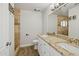 Bathroom boasts double sinks, granite counters, and tile shower at 8856 E Altadena Ave, Scottsdale, AZ 85260