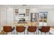 Updated kitchen featuring granite countertops and a large island with seating at 8856 E Altadena Ave, Scottsdale, AZ 85260