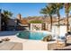 Relaxing pool area with waterfall feature and desert landscaping at 926 E Mountain Sky Ave, Phoenix, AZ 85048