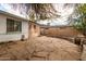 Large backyard with flagstone patio and mature trees at 10618 N 73Rd Dr, Peoria, AZ 85345