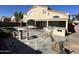 Large backyard with a covered patio, pool, and built-in BBQ at 12525 W Hearn Rd, El Mirage, AZ 85335