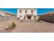 Large backyard with gravel and small trees at 12625 W Ash St, El Mirage, AZ 85335