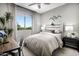 Cozy bedroom with rustic accents and a window seat at 1304 W Golden Ore Pass, Apache Junction, AZ 85120