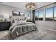 Spacious bedroom with large windows and plush bedding at 1304 W Golden Ore Pass, Apache Junction, AZ 85120