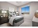 Charming bedroom with green accents and window at 1304 W Golden Ore Pass, Apache Junction, AZ 85120