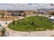 Aerial view of a community park with playground and pavilion at 1304 W Golden Ore Pass, Apache Junction, AZ 85120