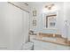 Clean bathroom with granite countertop and shower/tub at 1401 W Ocotillo Rd, Phoenix, AZ 85013