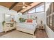 Main bedroom with high ceilings, wood-look floors, and ceiling fan at 1401 W Ocotillo Rd, Phoenix, AZ 85013