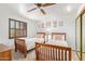 Bright bedroom with twin beds and ample closet space at 1401 W Ocotillo Rd, Phoenix, AZ 85013