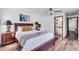 Cozy bedroom with a double bed and wood floors at 1401 W Ocotillo Rd, Phoenix, AZ 85013