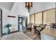 Entryway with wood floors, seating area, and view to living room at 1401 W Ocotillo Rd, Phoenix, AZ 85013