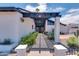 Pathway to front door under pergola with desert plants at 1401 W Ocotillo Rd, Phoenix, AZ 85013