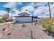 Landscaped front yard with desert plants and gravel at 1401 W Ocotillo Rd, Phoenix, AZ 85013