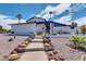 Landscaped front yard with walkway leading to home entrance at 1401 W Ocotillo Rd, Phoenix, AZ 85013