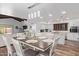 Bright kitchen features an island, stainless steel appliances, and dining area at 1401 W Ocotillo Rd, Phoenix, AZ 85013