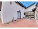 Brick patio with landscaping and exterior access at 1401 W Ocotillo Rd, Phoenix, AZ 85013