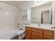 Functional bathroom featuring tub-shower combination and single sink vanity at 14995 W Desert Hills Dr, Surprise, AZ 85379