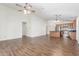 Open-concept living area featuring tile floors and neutral-colored walls at 14995 W Desert Hills Dr, Surprise, AZ 85379