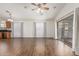 Spacious living room with tile floors and sliding glass doors at 14995 W Desert Hills Dr, Surprise, AZ 85379
