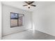 Simple bedroom with large window and carpeted floor at 15071 N 49Th Way, Scottsdale, AZ 85254