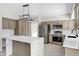 Modern kitchen with stainless steel appliances and white cabinets at 15071 N 49Th Way, Scottsdale, AZ 85254