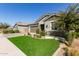 Landscaped yard and curb appeal at 15320 W Baden St, Goodyear, AZ 85338