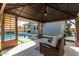 Relaxing gazebo overlooking the pool and backyard at 15320 W Baden St, Goodyear, AZ 85338